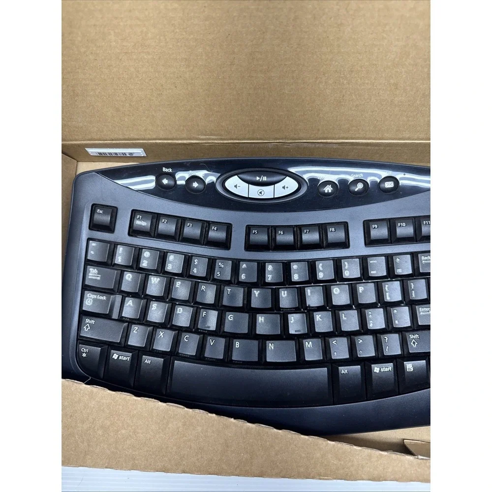 Microsoft Comfort Curve Keyboard 2000 Ergonomic Wired USB Black Model 1047